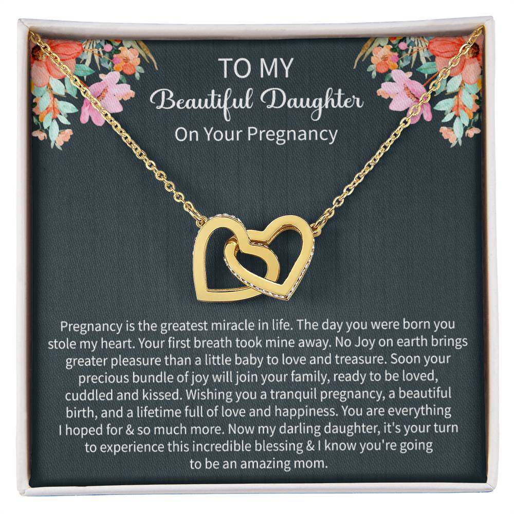 Giftsignature necklace presented in a gift box as a heartfelt pregnancy gift for a daughter