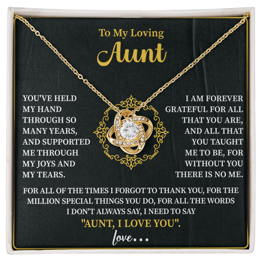 close up of a delicate love knot pendant chosen as a meaningful gift for aunt