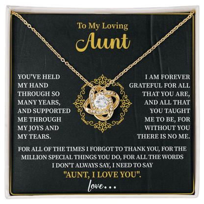 close up of a delicate love knot pendant chosen as a meaningful gift for aunt