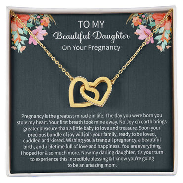 Giftsignature necklace presented in a gift box as a heartfelt pregnancy gift for a daughter