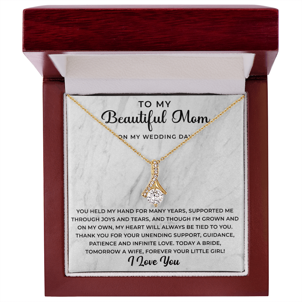 mother of the bride jewelry paired with a touching message card