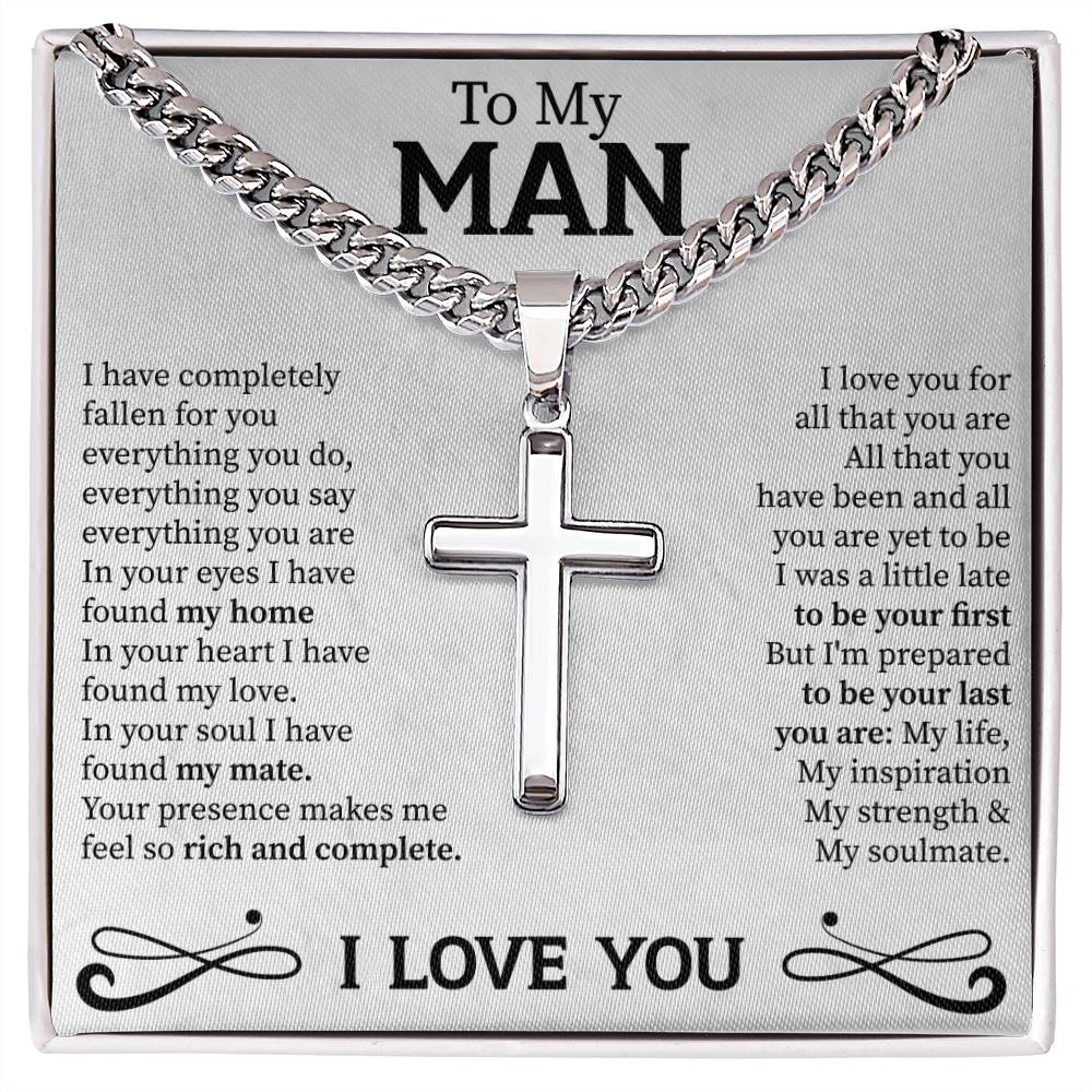 cuban link chain necklace with engraved artisan cross gifted to a man as a symbol of love and strength