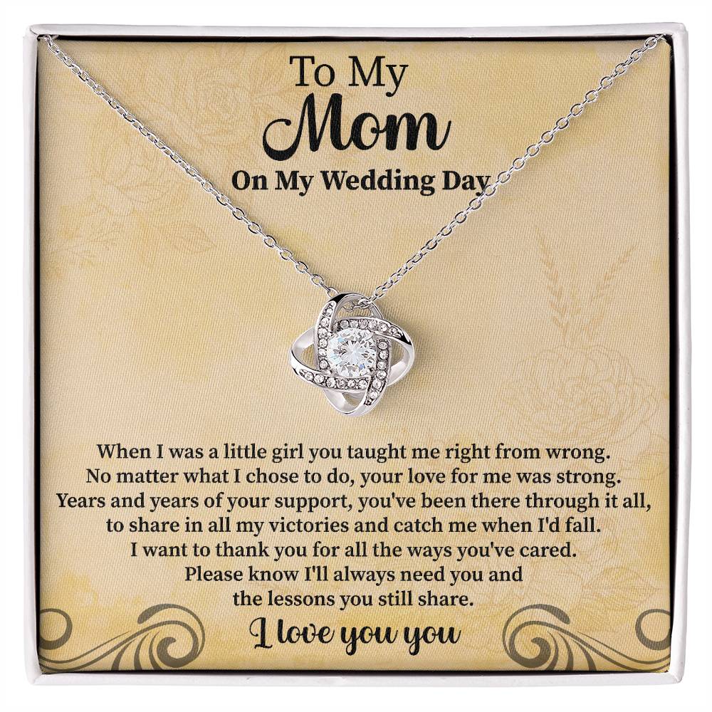 to my mom on my wedding day love knot necklace displayed as a heartfelt gift