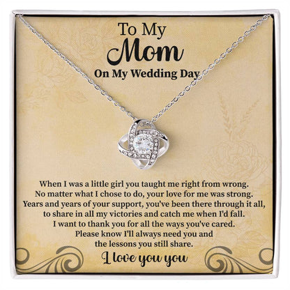 to my mom on my wedding day love knot necklace displayed as a heartfelt gift